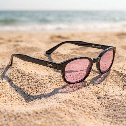 X-KD's 1014, lunettes de soleil grande taille à monture noire brillante et verres rose clair.